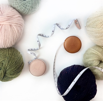 Sommerfuglens målebånd med læder